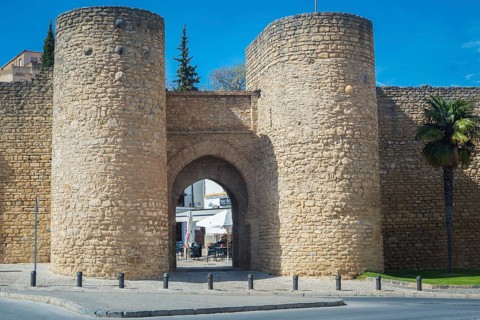 Ronda, Spain, April 2023: View on the Puerta de Almocabar, ancient gate to the town of Ronda,