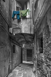 Hanging laundry in front of a window in an alley in the historic centre, Genoa, Italy, Europe