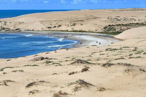 Sand dunes and sandy beach near the village Barra de Valizas, seaside resort, balneario along
