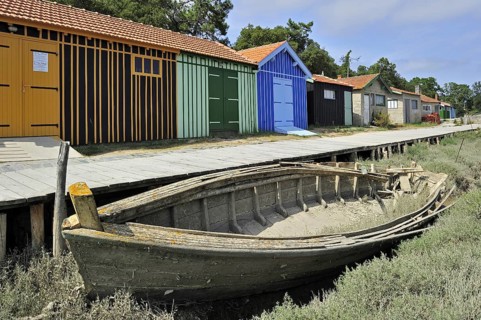 Colourful cabins of oyster farm at la Baudissière near Dolus, Saint-Pierre-d'Oléron on the island