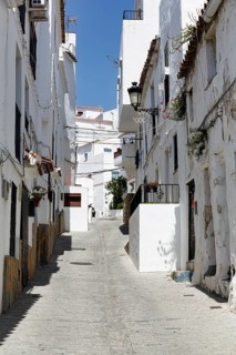 Typical white village Casares, houses, narrow alley on a hill, Route of the white villages, Malaga,