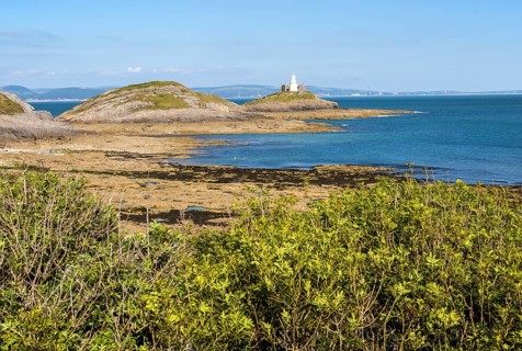 Lighthouse at Mumbles Head, Gower peninsula, near Swansea, South Wales, UK