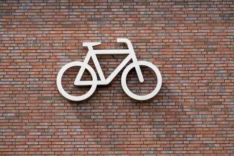 Bicycle symbol on a wall, pictogram, bicycle car park, Dülmen, Münsterland, North Rhine-Westphalia,