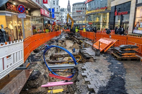 Construction site in the city centre of Wuppertal, laying of new pipelines, various supply lines