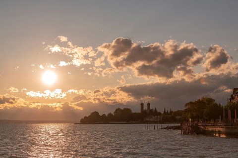 Baroque castle church, double tower, onion dome, evening light, Friedrichshafen on Lake Constance
