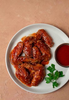 Chicken wings, with barbecue sauce, with tomato sauce, fast food, no people