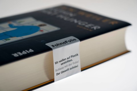 Book, new edition, without plastic packaging, plastic film, only with a paper seal, waste avoidance