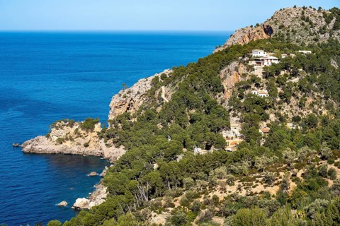 Villas on the cliffs in the north-west of the island, near Alconàsser, Serra de Tramuntana,