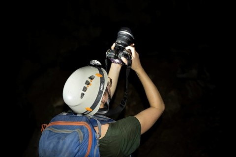 Young woman photographed in a stalactite cave, Terciopelo Cave, Barra Honda National Park, Costa