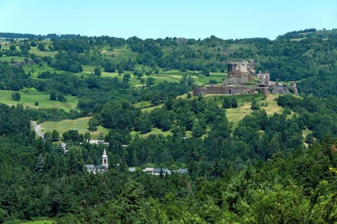 View of the medieval castle of Murol in the Auvergne Volcanoes Regional Natural Park, Puy de Dome,