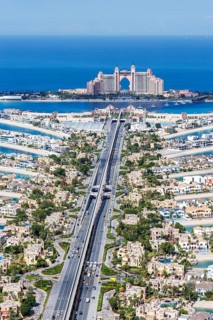 The Palm Jumeirah with Atlantis Hotel artificial island from above in Dubai, United Arab Emirates,