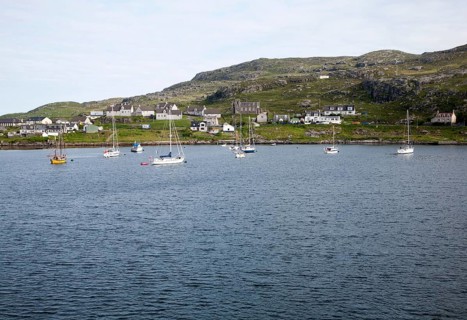 Yachts moored in the harbour at Castlebay, Barra, Outer Hebrides, Scotland, UK