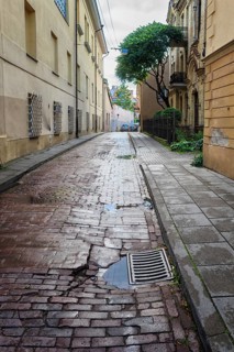 Old street of the historic center of Vilnius after rain