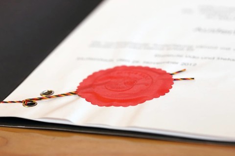 Notarised contract with red official seal