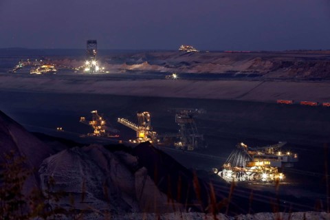 Lignite excavators extract coal in the Welzow open-cast mine, operated by LEAG. The lignite is