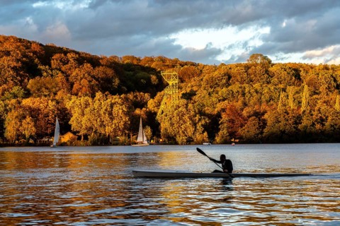 Lake Baldeney, a reservoir of the Ruhr, in Essen, autumn, sailing boats, headframe of the former