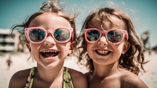 Two young girlfriends posing wearing sunglasses having fun on the beach, generatvie AI, AI