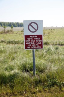 Ministry of Defence warning sign about the danger posed by military firing range on Salisbury