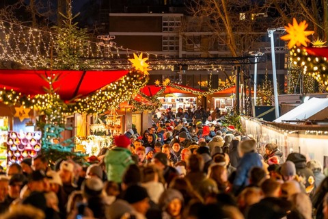 Christmas market at Roncalli Platz am Dom, in the city centre of Cologne, Sunday shopping in