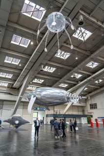 Mechanical flying objects, filled with helium, controlled by fine mechanics, movements copied from