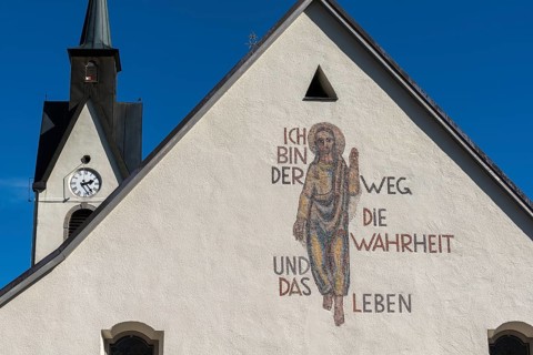 Schwarzenberg, Bregenz district, Bregenzerwald, parish church, tower clock, Jesus mosaic, Bible