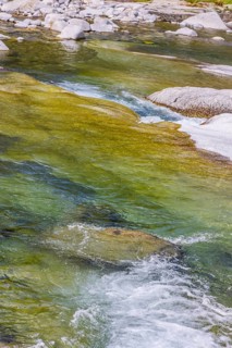 Rein da Christallina torrent near Medel. Pools with crystal-clear water in the riverbed. Canton of