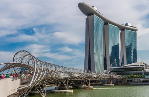 Hotel and casino Marina Bay and helix bridge in Singapore