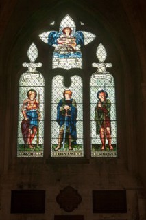 Stained glass window in Malmesbury abbey, Wiltshire, England, UK, Faith, Courage, Devotion by