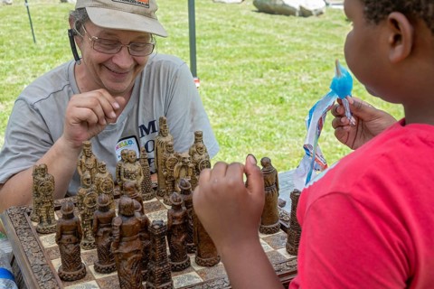 Detroit, Michigan, A chess game at the annual 'Summer Sizzler' picnic and party held by two Detroit