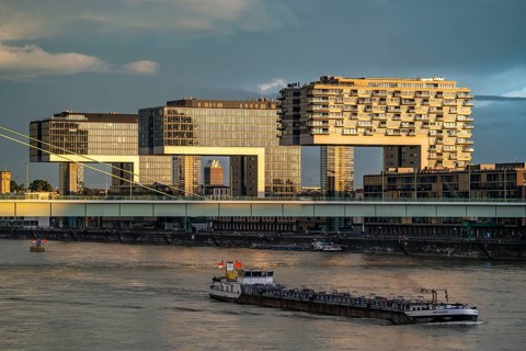 Severin Bridge over the Rhine, crane houses, cargo ship, Cologne, North Rhine-Westphalia, Germany,