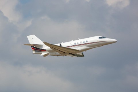 A Cessna Citation Latitude private jet aircraft of Netjets with the registration number N525QS at