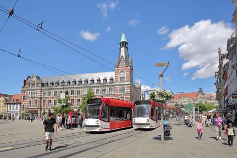 Historic main post office built in 1882 and tram stop, tram, tracks, pedestrian, pedestrian zone,