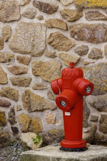 Red hydrant, Ile de Bréhat, Cotes-d'Armor, Brittany, France, Europe