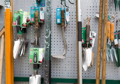 Display of gardening tools on sale, The Walled garden plant nursery, Benhall, Suffolk, England, UK