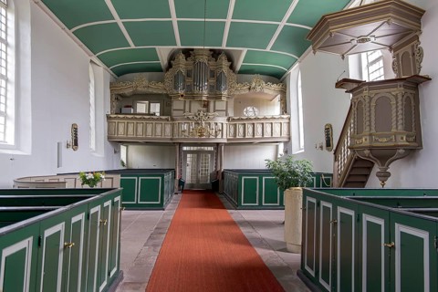 Protestant Reformed Church from 1401, interior with pews, pulpit and organ, Greetsiel, Krummhörn,