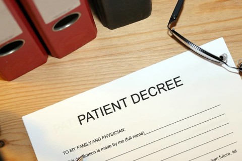 Symbolic image: Healthcare proxy, living will in English on a desk