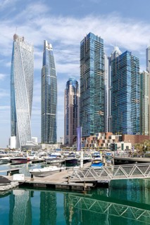 Dubai Marina skyline skyscrapers with yachts property skyscrapers living on the waterfront in