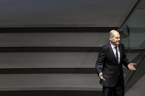 Olaf Scholz (SPD), Federal Chancellor, arrives in the plenary chamber of the German Bundestag in