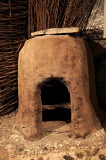 Bread oven in Iron Age museum, Andover, Hampshire, England, UK