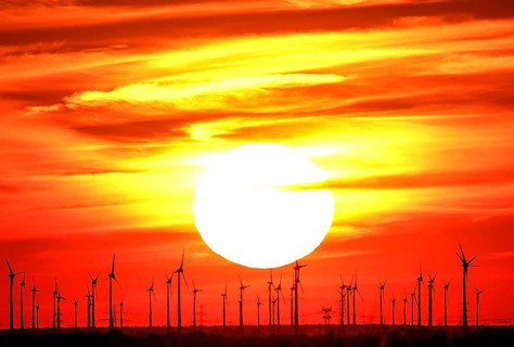 Sunset at a wind farm in Nauen in Brandenburg, 23/08/2022