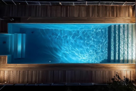 AI generated aerial view perpendicular top down of an wooden deck with a swimming pool at night
