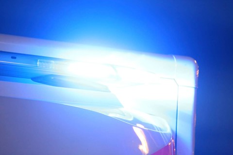 Close-up of a blue light on an ambulance at night (Berlin)