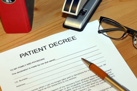 Symbolic image: Healthcare proxy, living will in English on a desk