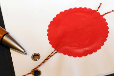 Notarised contract with red official seal