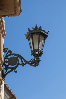 Historic street lamp on a historic house facade, Ronda, Andalusia, Spain, Europe