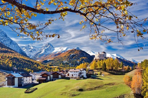 Village view of Tarasp with castle in autumn, Scuol, Canton Graubünden, Switzerland, Europe