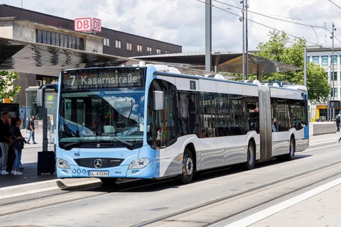 Mercedes-Benz Citaro public transport bus at the main railway station stop in Ulm, Germany, Europe