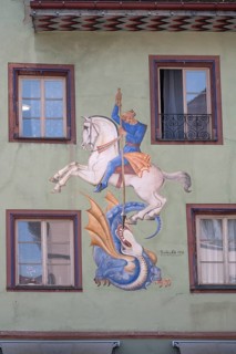 Fresco of St George and the dragon from 1954, on the façade of the former town chancellery and