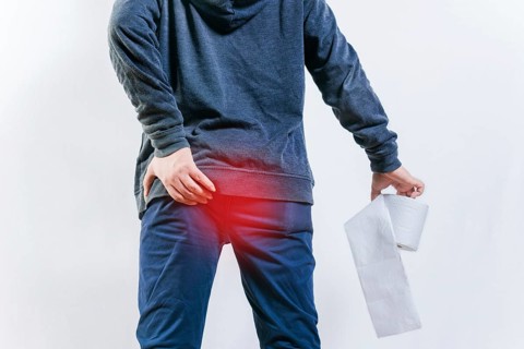 People with diarrhea problems, holding bathroom toilet paper isolated. Concept of person with