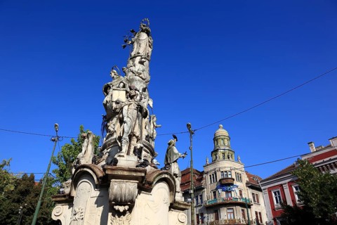 At Piata Libertatii, Freedom Square, baroque Marian column with St John of Nepomuk, Timisoara,